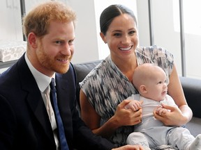 Prince Harry, Duke of Sussex, Meghan, Duchess of Sussex and their baby son Archie Mountbatten-Windsor during their royal tour of South Africa on September 25, 2019 in Cape Town, South Africa.