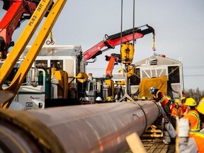 Trans Mountain continues construction on the 1,100-kilometre expansion, with no changes in the commitments of oil producers that it's relying on.