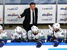 Travis Green, pictured, will be aided by the hiring of Brad Shaw as a Canucks' assistant coach.