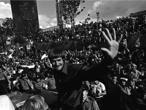 Head coach Tony Waiters of the 1979 Soccer Bowl champion Vancouver Whitecaps waves to fans on the team's return to the West Coast on Sept. 9, 1979.