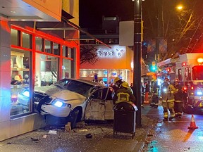 The driver of a car died after he crashed into a storefront on Granville Street at West 13th Avenue on Friday, Nov. 13, 2020.