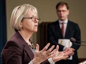 Dr. Bonnie Henry and Health Minister Adrian Dix during a COVID-19 briefing Nov.12.