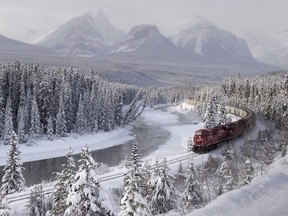 A Canadian Pacific freight train travels around Morant's Curve near Lake Louise, Alta., in December 2014.