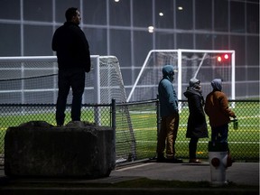 People watch a youth soccer match in Burnaby on Nov. 7.