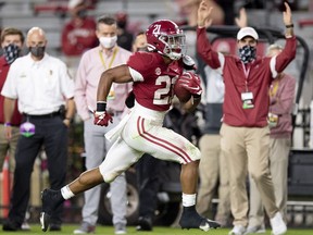 Alabama Crimson Tide running back Jase McClellan runs for a touchdown against the Kentucky Wildcats on a fourth-down play at Bryant-Denny Stadium in Tuscaloosa, Ala., on Nov. 21, 2020.