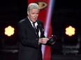 FILE: "Jeopardy!" host Alex Trebek presents the Hart Memorial Trophy during the 2019 NHL Awards at the Mandalay Bay Events Center on June 19, 2019 in Las Vegas, Nevada.