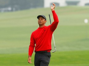 Tiger Woods reacts on the second hole during his final round at the Masters golf tournament in Augusta, Ga., on Nov. 15, 2020.