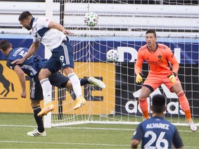 Vancouver Whitecaps forward Lucas Cavallini heads home the opening goal during his team's 3-0 win over the Los Angeles Galaxy at Providence Park on Nov. 8, 2020. The March 8 beginning of training camp will be four months since the Caps last played a game, the longest off-season in team history.