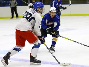 The Vancouver Giants have traded for defenceman Zach Ashton (left, at Saskatoon Blades training camp in 2017), acquiring the puck-moving rearguard from the Lethbridge Hurricanes.