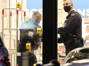 The scene of a targeted shooting outside the Shoppers Drug Mart at 152nd Street and Fraser Highway in Surrey on November 30.