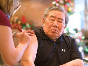 Andy Yoon, a 77-year-old Abbotsford resident, was the first long-term care resident in the Fraser Health region to receive the COVID-19 vaccination — and on Christmas Eve of all days.
