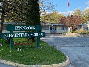 An employee at Lynnmour Xá7elcha Elementary School in North Vancouver was arrested Monday on allegations of possessing and distributing child pornography.