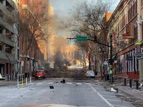 In this photo from the Twitter page of the Metro Nashville Police Department, damage is seen on a street after an explosion in Nashville on December 25, 2020.