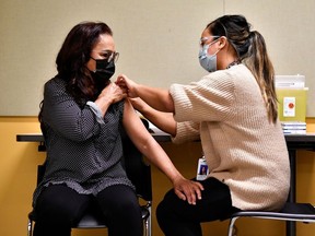 Nisha Yunus, a residential care aide at Providence Health Care, became the first British Columbian to receive the Pfizer-BioNTech COVID-19 vaccine.