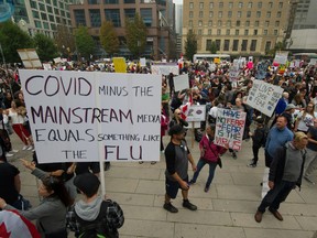 VANCOUVER, BC - September 13, 2020 - Protesters rally at Vancouver Art Gallery after marching downtown for Celebration of Freedoms and Rights, No New Normal, The Line, Hugs Over Masks, CLEAR, Liberty Talk Canada and Unify the People in Vancouver, B.C., September 13, 2020. (Photo by Arlen Redekop / Vancouver Sun / The Province -PNG)