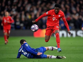 Bayern Munich's Alphonso Davies in action with Chelsea's Andreas Christensen in Champions League Round of 16 First Leg match at Stamford Bridge, London on February 25, 2020.