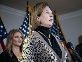Sidney Powell addresses a news conference at the Republican National Committee headquarters in Washington, D.C.