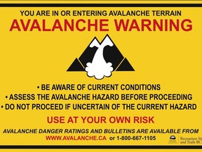 UNDATED -- march 16, 2010 undated handout photo of "mountain pass" , avalanche warning sign posted by the Ministry of Tourism, Culture and the Arts at popular snowmobile areas in B.C. (For story by Larry Pynn.) [PNG Merlin Archive]