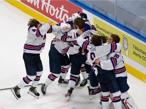The United States team celebrates its victory over Canada during the 2021 IIHF World Junior Championship gold medal game at Rogers Place on January 5, 2021 in Edmonton, Canada.
