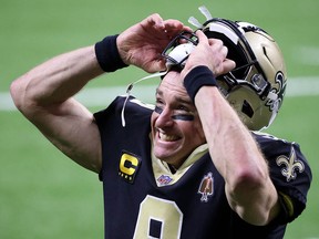 New Orleans Saints QB Drew Brees celebrates after defeating the Chicago Bears to advance to the divisional round last Sunday.
