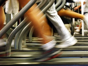 File photo of runners using treadmills in a public gym.