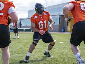 Lions' 6-foot-6, 320-pound left tackle Joel Figueroa doing blocking drills in 2019. He's re-signed for a third year with B.C.