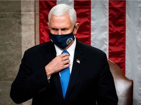 Vice President Mike Pence presides over a Joint session of Congress to certify the 2020 Electoral College results after supporters of President Donald Trump stormed the Capitol earlier in the day on Capitol Hill in Washington, DC on January 6, 2020.