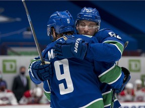 Team leaders J.T. Miller (left) and Bo Horvat say it’s on the ‘guys in the room’ to turn around the listing Canucks ship and salvage the season, only 16 games into the 2021-22 campaign.