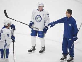 Brogan Rafferty, centre, has been one of the bright spots at the Vancouver Canucks' training camp at Rogers Arena.