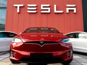 Tesla Inc delivered 499,550 vehicles, above Wall Street estimates of 481,261 vehicles, according to Refinitiv data, but 450 units short of Chief Executive Officer Elon Musk's target for 2020.