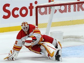 Calgary Flames goaltender Jacob Markstrom, making a sliding glove save against the Winnipeg Jets on Thursday, will face the Vancouver Canucks on Saturday.