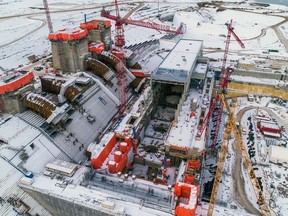 Aerial view of the Site C powerhouse, penstocks and intakes under construction in January 2021.