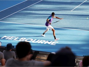 Nick Kyrgios of Australia plays a forehand in his singles match against Harry Bourchier of Australia during day three of the ATP 250 Murray River Open at Melbourne Park on February 03, 2021 in Melbourne, Australia.