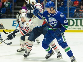 Canucks prospect Kole Lind in action last season with the Utica Comets.