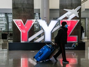 A passenger is pictured at Pearson International Airport on Jan. 31, 2021.