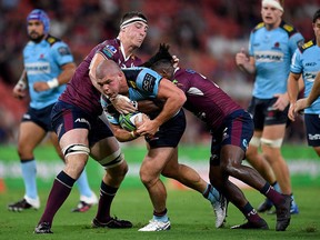 Action from a Super Rugby match between the Queensland Reds and NSW Waratahs at Suncorp Stadium in Brisbane on Feb. 19, 2021. It's unclear whether rights to the matches will get picked up in Canada.