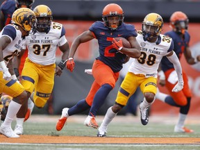 Reggie Corbin of the Illinois Fighting Illini runs the ball during a 2018 game against the Kent State Golden Flashes at Memorial Stadium in Champaign, Ill.