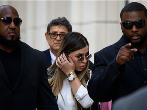 (FILES) In this file photo Emma Coronel Aispuro, wife of Joaquin "El Chapo" Guzman walks out of Brooklyn Federal Court on July 17, 2019, after Mexican drug lord Joaquin "El Chapo" Guzman's sentencing, in New York city. - US authorities arrested the wife of jailed Mexican drug lord Joaquin "El Chapo" Guzman Loera February 22 as she arrived at Dulles International Airport outside of Washington, the Justice Department said.

Emma Coronel Aispuro, 31, faces charges of conspiracy to traffick cocaine, methamphetamine, heroin and marijuana for importation into the United States, it said.