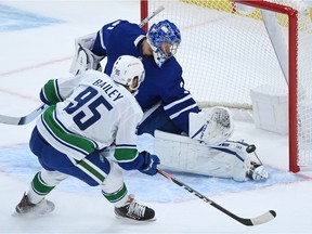 Vancouver Canucks Justin Bailey is stopped by Toronto Maple Leafs goaltender Frederik Andersen (31) on a breakaway during first period NHL hockey action in Toronto on Monday Feb. 8, 2021.