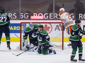 Canucks goalie Thatcher Demko and defenceman Nate Schmidt are both literally and figuratively on their knees after falling behind to the Edmonton Oilers in the second period of Thursday night’s NHL game at Rogers Arena.