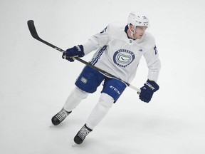 ‘We all want the same thing which is to play in the lineup and make an impact,’ Canucks utility defenceman Brogan Rafferty says of waiting for his turn, which may not come this season, on the club’s taxi squad.
