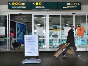 Scenes from the International arrivals level at Vancouver International Airport (YVR) as a mandatory three day quarantine takes effect, in Richmond, BC., on February 22, 2021.