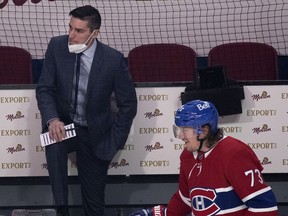 Canadiens assistant coach Alex Burrows speaks with Habs right-winger Tyler Toffoli during the pre-game skate in NHL play against the Ottawa Senators in Montreal on March 2.