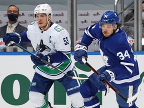 Canucks captain Bo Horvat (left) may be seeing plenty of Auston Matthews, should his injured wrist be healed, when the Toronto Maple Leafs come to Rogers Arena for a two-game set starting Thursday.