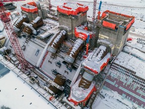 Ana aerial view of the Site C powerhouse, penstocks and intakes in January. The dam and generating station on the Peace River near Fort St. John.