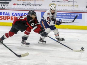 Justin Sourdif (left), who was player of the year in the WHL’s B.C. Division last spring after leading it in scoring with 34 points, is a good bet to be named the Vancouver Giants captain once he’s returned to the WHL club from NHL camp with the Florida Panthers.