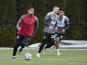 Erik Godoy moves the ball upfield during a recent Whitecaps training camp session. He’s a big part of the team’s defensive turnaround down the stretch.