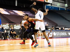 Fraser Valley Bandits guard Malcolm Duvivier spins past Dorian Pinson of the Niagara River Lions during the CEBL Summer Series last August.