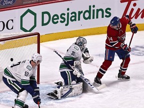 Nick Suzuki (not pictured) gets the late equalizer past Canucks goalie Thatcher Demko in the third period at Bell Centre.