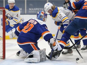 Buffalo Sabres centre Eric Staal (12) tries to shoot the puck against New York Islanders goalie Ilya Sorokin during NHL action at Nassau Veterans Memorial Coliseum on March 4.